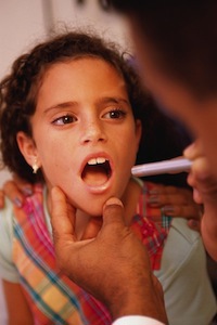 Child receiving polio vaccine